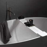 Drift free standing bath tub